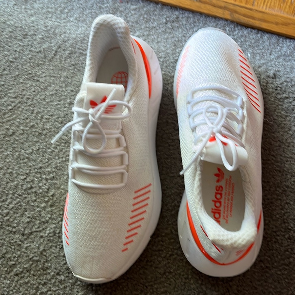Adidas white sneaker with orange accents, size 8 1/2, worn only once outside!